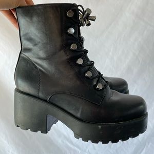 Black chunky combat boots with zipper
